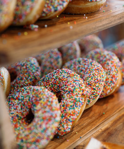 Sprinkle donuts on display at Cubby Kiosk